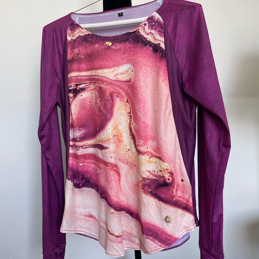 Tri Sirena long sleeved running top. Size M EUC Worn a few times.